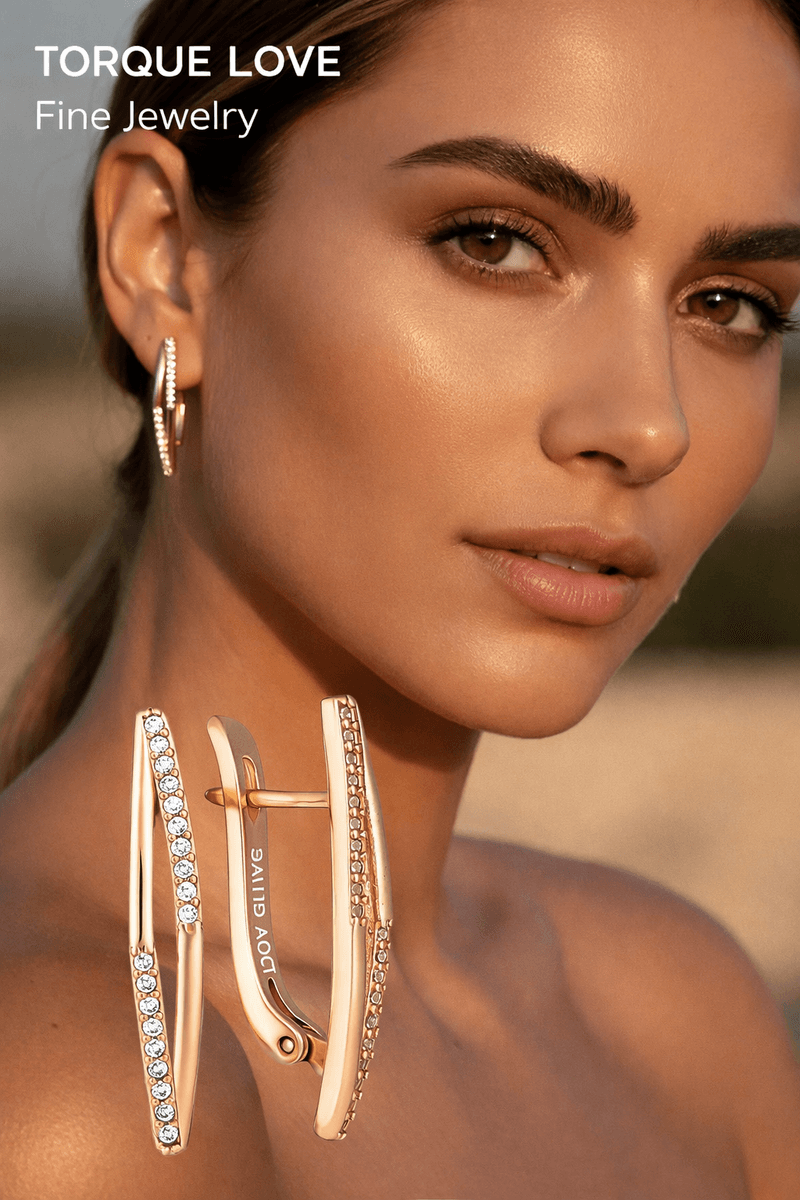 Long rhombus earrings with stones