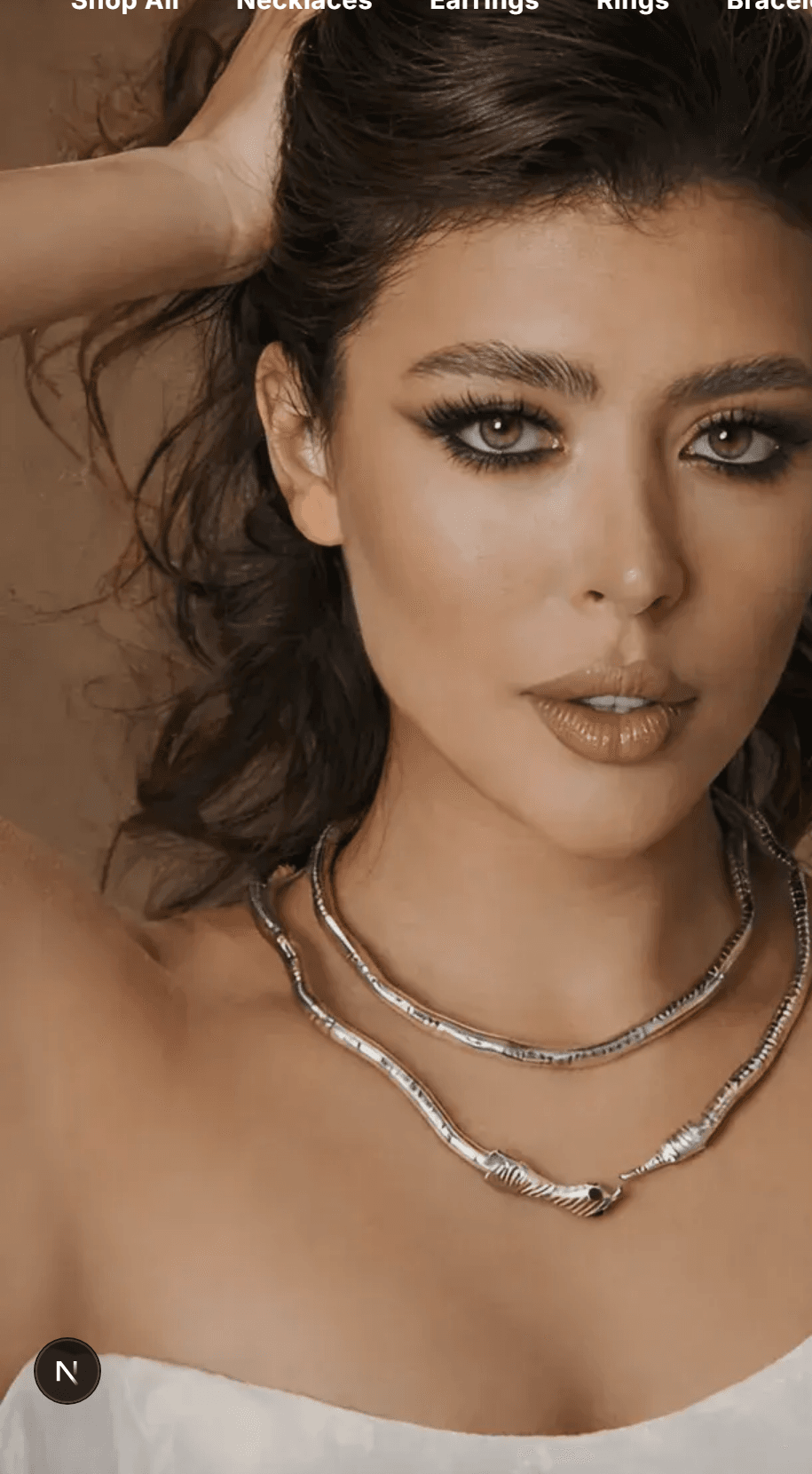 Model wearing TorqueLove jewelry